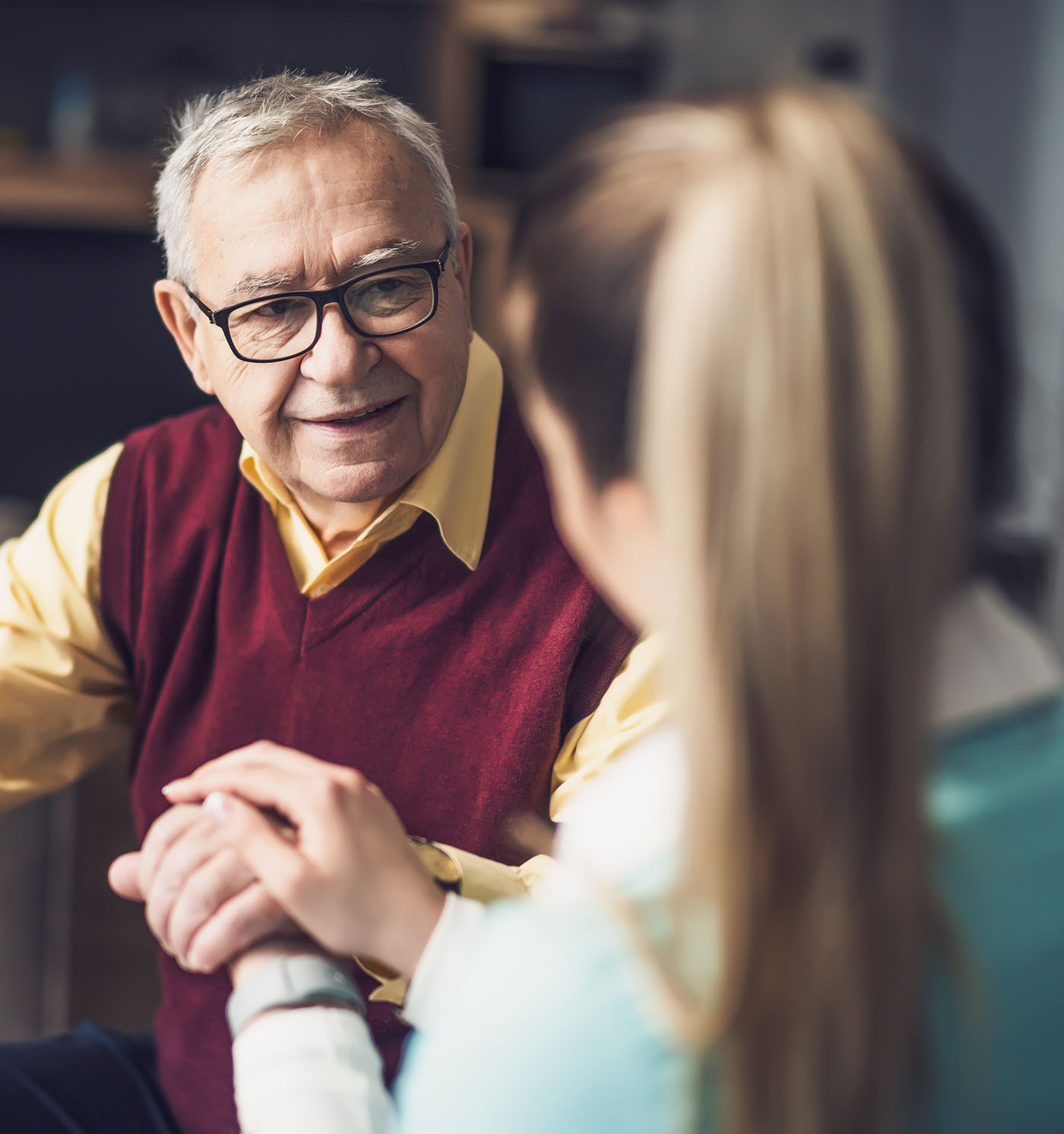 Dementia care worker supporting an older adult through person-centred communication