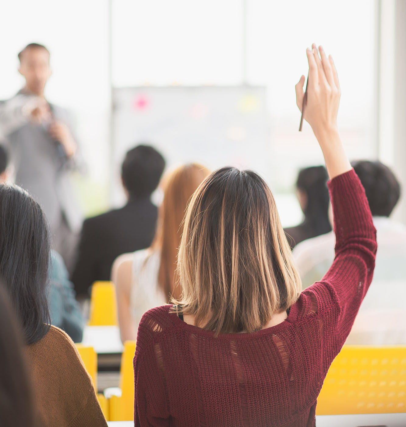 Staff attending a professional training course led by an experienced trainer